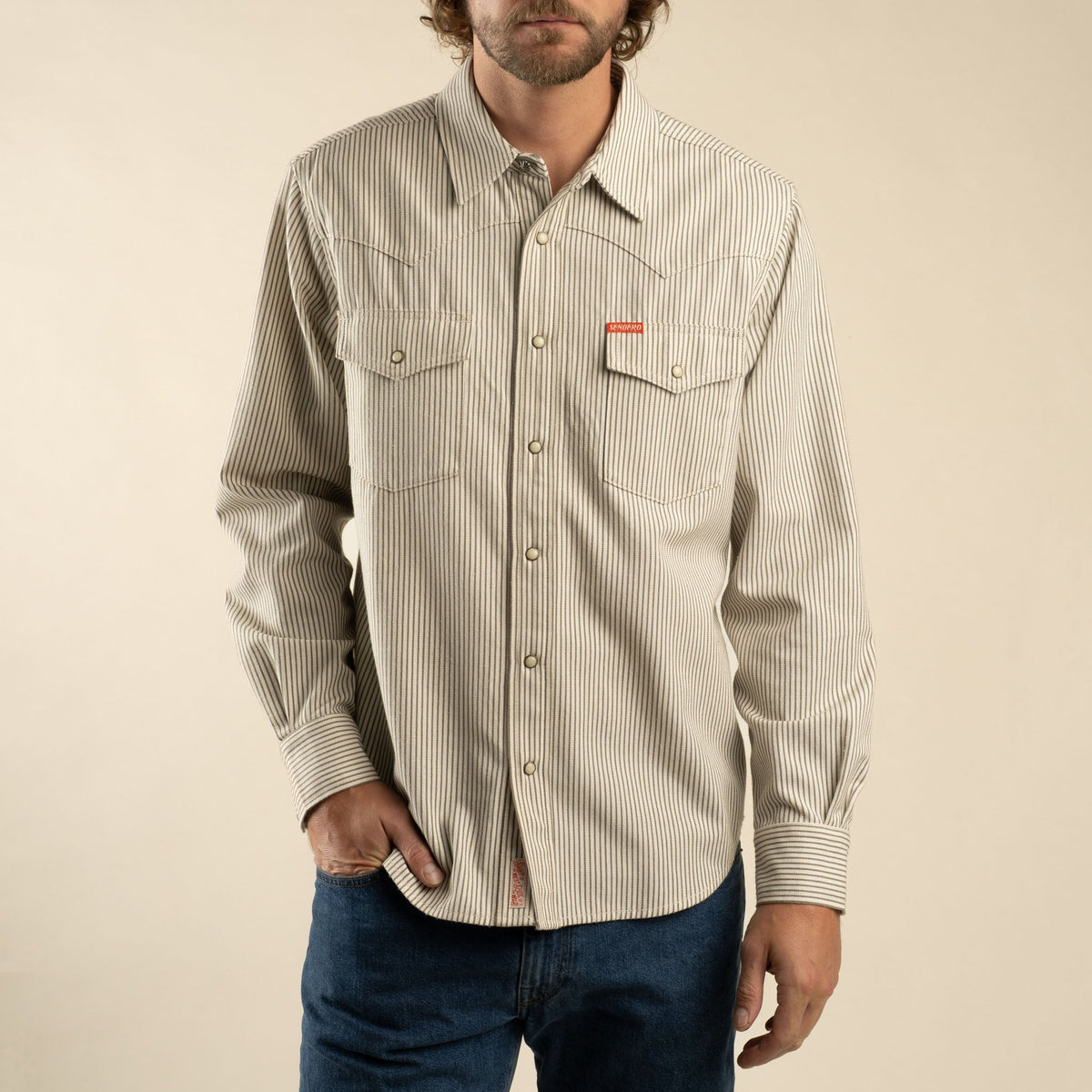 Sendero Provisions Co. The Wyatt Pearl Snap Long Sleeve Denim Shirt